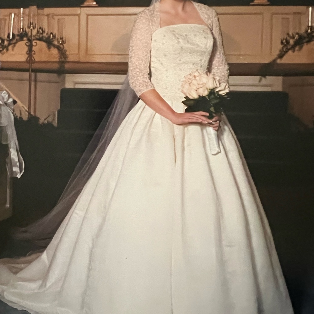 Timeless Ivory Bridal Gown with Lace Sleeves